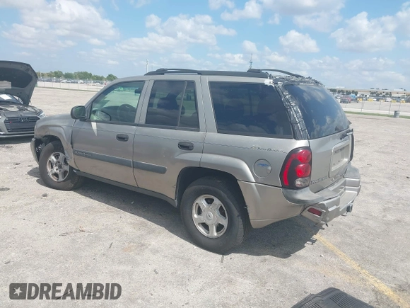 2003 Chevrolet TrailBlazer LS with VIN 1GNDT13SX32367807, listed as a IAAI auction lot 42070031 with 162,966 mi miles and . Bid and sale history available at DreamBid. Image 3.