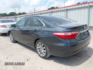 2015 Toyota Camry XLE with VIN 4T1BF1FKXFU881017, listed as a IAAI auction lot 42054825 with 122,232 mi miles and . Bid and sale history available at DreamBid. Image 3.