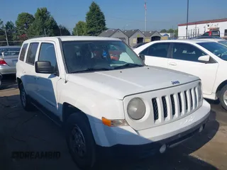 2014 Jeep Patriot Sport with VIN 1C4NJPBA5ED812315, listed as a IAAI auction lot 41264770 with 138,155 mi miles and . Bid and sale history available at DreamBid. Image 1.