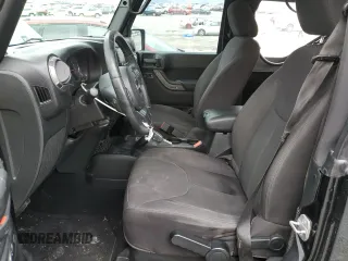 2014 Jeep Wrangler Sport with VIN 1C4AJWAG5EL326480, listed as a Copart auction lot 60653955 with 94,102 mi miles and Salvage title. Bid and sale history available at DreamBid. Image 7.