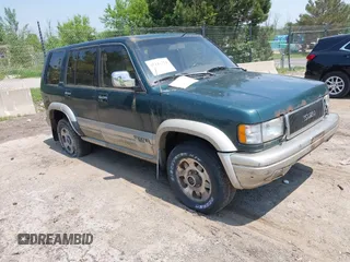 1995 Isuzu Trooper with VIN JACDJ58WXS7911000, listed as a IAAI auction lot 42447754 with 214,946 mi miles and . Bid and sale history available at DreamBid. Image 1.
