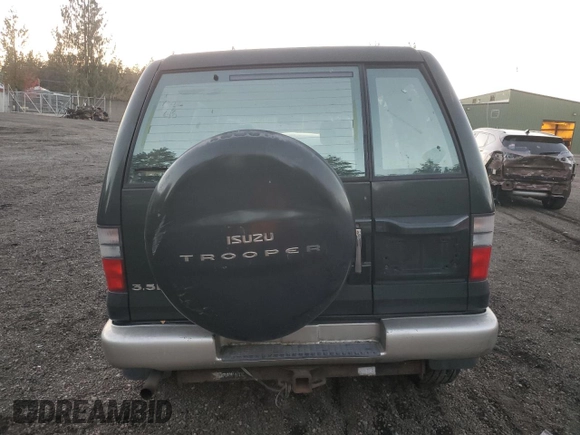 2002 Isuzu Trooper S с VIN JACDJ58X427J04562, выставлен на аукционе Copart как лот 79278184 с пробегом Не указан миль и Списание • Salvage title. История ставок и продаж доступна на DreamBid. Изображение 6.