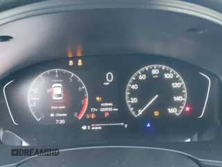 2022 Honda Civic Sport z VIN 2HGFE2F53NH569990, wystawiony jako IAAI lot #41944635 z przebiegiem 20 935 mil mil oraz . Historia ofert i sprzedaży dostępna na DreamBid. Obrazek 7.