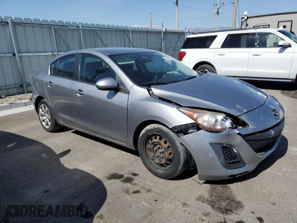 2011 Mazda 3 i Sport with VIN JM1BL1UG7B1455776, listed as a Copart auction lot 54235235 with 133,040 mi miles and Salvage Title. Bid and sale history available at DreamBid. Image 4.