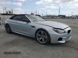 2014 BMW M6 z VIN WBSLZ9C50EDZ78344, wystawiony jako Copart lot #54719265 z przebiegiem 59 556 mil mil oraz Szkoda całkowita • Salvage title. Historia ofert i sprzedaży dostępna na DreamBid. Obrazek 4.