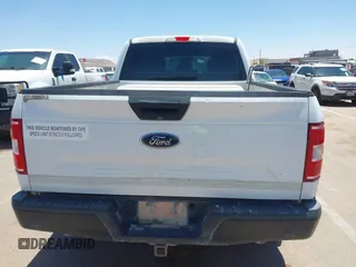 2018 Ford F-150 XL with VIN 1FTFX1E5XJKD86996, listed as a IAAI auction lot 42256819 with 141,798 mi miles and . Bid and sale history available at DreamBid. Image 16.