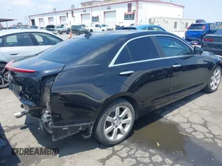 2013 Cadillac ATS z VIN 1G6AA5RA1D0179071, wystawiony jako IAAI lot #42438437 z przebiegiem 97 558 mil mil oraz . Historia ofert i sprzedaży dostępna na DreamBid. Obrazek 4.