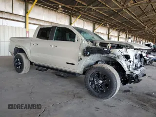 2023 GMC Canyon 2WD Elevation with VIN 1GTP5BEK7P1248837, listed as a Copart auction lot 77825924 with 6,793 mi miles and Salvage Title. Bid and sale history available at carsss.com. Image 4.