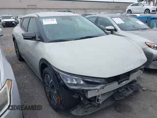 2022 Kia EV6 Wind z VIN KNDC34LA8N5047206, wystawiony jako IAAI lot #41922480 z przebiegiem 22 414 mil mil oraz . Historia ofert i sprzedaży dostępna na DreamBid. Obrazek 1.