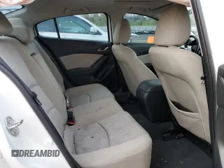2016 Mazda 3 i Touring z VIN JM1BM1W70G1299548, wystawiony jako Copart lot #52575085 z przebiegiem 136 964 mil mil oraz Szkoda całkowita • Salvage title. Historia ofert i sprzedaży dostępna na DreamBid. Obrazek 10.