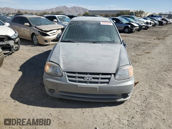 2003 Hyundai Accent GL with VIN KMHCG45C13U455449, listed as a Copart auction lot 42625285 with 0 mi miles and Salvage Title. Bid and sale history available at carsss.com. Image 5.