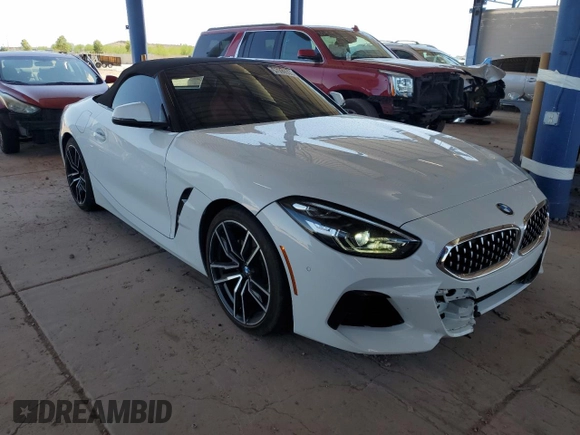 2020 BMW Z4 sDrive30i with VIN WBAHF3C0XLWW60530, listed as a Copart auction lot 57099555 with 20,464 mi miles and Salvage title. Bid and sale history available at DreamBid. Image 4.
