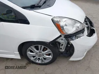 2009 Honda Fit Sport with VIN JHMGE88409S021730, listed as a IAAI auction lot 42045023 with 309,995 mi miles. Bid and sale history available at carsss.com. Image 18.
