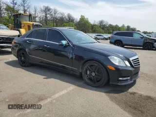 2013 Mercedes-Benz E 550 Sport with VIN WDDHF9BB8DA759750, listed as a Copart auction lot 59177825 with 63,620 mi miles and Salvage title. Bid and sale history available at DreamBid. Image 4.