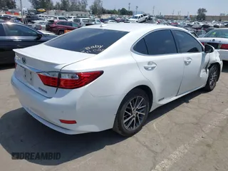 2013 Lexus ES 300h with VIN JTHBW1GGXD2036500, listed as a IAAI auction lot 42153501 with 249,961 mi miles and . Bid and sale history available at DreamBid. Image 4.