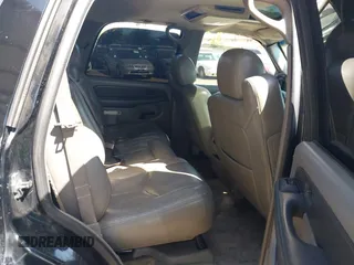 2003 Chevrolet Tahoe LS z VIN 1GNEC13T53J331221, wystawiony jako IAAI lot #42422243 z przebiegiem Nie podano mil oraz . Historia ofert i sprzedaży dostępna na DreamBid. Obrazek 8.
