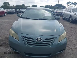 2007 Toyota Camry CE with VIN 4T1BE46K37U569515, listed as a IAAI auction lot 41974482 with 242,042 mi miles. Bid and sale history available at carsss.com. Image 12.