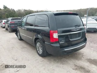 2013 Chrysler Town & Country Touring L with VIN 2C4RC1CG7DR510466, listed as a IAAI auction lot 42180370 with 103,821 mi miles and . Bid and sale history available at DreamBid. Image 3.