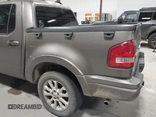 2007 Ford Explorer Sport Trac Limited z VIN 1FMEU53887UA02747, wystawiony jako IAAI lot #41891677 z przebiegiem 205 308 mil mil oraz . Historia ofert i sprzedaży dostępna na DreamBid. Obrazek 14.