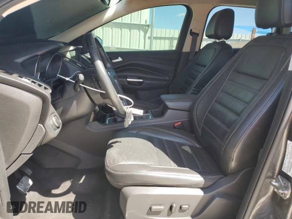 2017 Ford Escape Titanium with VIN 1FMCU0J95HUF02694, listed as a Copart auction lot 49861745 with 114,602 mi miles and Salvage Title. Bid and sale history available at DreamBid. Image 7.