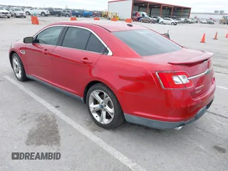 2010 Ford Taurus SHO with VIN 1FAHP2KT4AG122263, listed as a IAAI auction lot 41930902 with 128,977 mi miles and . Bid and sale history available at DreamBid. Image 3.