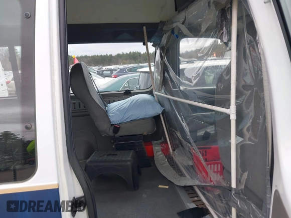 2012 Ford Econoline Cargo Recreational with VIN 1FTNE2EW3CDA30347, listed as a IAAI auction lot 41600459 with 232,679 mi miles and . Bid and sale history available at DreamBid. Image 8.