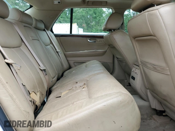 2006 Cadillac DTS 1SC z VIN 1G6KD57Y26U177384, wystawiony jako Copart lot #58200665 z przebiegiem 122 356 mil mil oraz Szkoda całkowita • Salvage title. Historia ofert i sprzedaży dostępna na DreamBid. Obrazek 10.