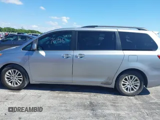 2015 Toyota Sienna XLE with VIN 5TDYK3DC3FS631916, listed as a IAAI auction lot 42043495 with 76,986 mi miles and . Bid and sale history available at DreamBid. Image 14.