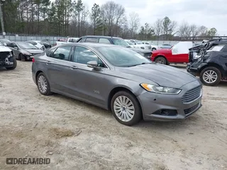 2014 Ford Fusion Energi Titanium with VIN 3FA6P0SUXER216618, listed as a IAAI auction lot 41511643 with 145,017 mi miles. Bid and sale history available at carsss.com. Image 1.