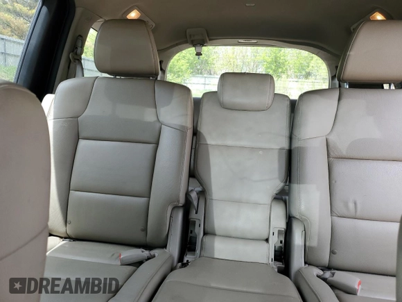 2014 Honda Odyssey Touring z VIN 5FNRL5H97EB508649, wystawiony jako Copart lot #55665245 z przebiegiem 162 892 mil mil oraz Czysty tytuł • Clean title. Historia ofert i sprzedaży dostępna na DreamBid. Obrazek 10.