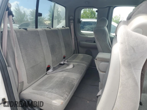 2002 Ford F-150 XL with VIN 1FTRX18L62KC53807, listed as a Copart auction lot 57463075 with 173,301 mi miles and Salvage title. Bid and sale history available at DreamBid. Image 10.