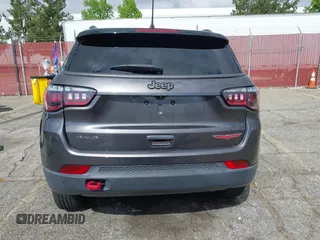 2021 Jeep Compass Trailhawk with VIN 3C4NJDDB6MT561074, listed as a IAAI auction lot 42125886 with 77,293 mi miles and . Bid and sale history available at DreamBid. Image 17.