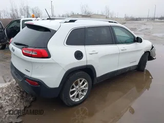 2016 Jeep Cherokee Latitude with VIN 1C4PJMCB3GW193834, listed as a IAAI auction lot 41675853 with 149,296 mi miles. Bid and sale history available at carsss.com. Image 4.