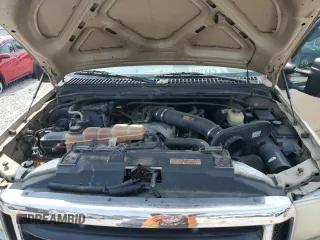 2001 Ford Super Duty F-250 XL with VIN 1FTNX21S31EA51607, listed as a Copart auction lot 64711164 with 137,934 mi miles and Salvage Title. Bid and sale history available at carsss.com. Image 11.