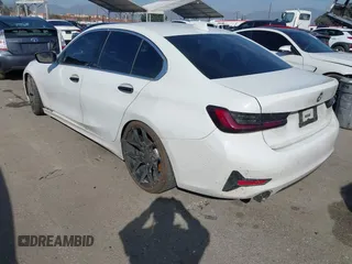 2019 BMW 3 Series 330i with VIN WBA5R1C59KAJ99746, listed as a IAAI auction lot 41566192 with 55,090 mi miles and . Bid and sale history available at DreamBid. Image 3.