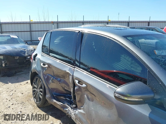 2012 Volkswagen Golf TDI z VIN WVWDM7AJ9CW240204, wystawiony jako IAAI lot #41837287 z przebiegiem 172 512 mil mil oraz . Historia ofert i sprzedaży dostępna na DreamBid. Obrazek 6.