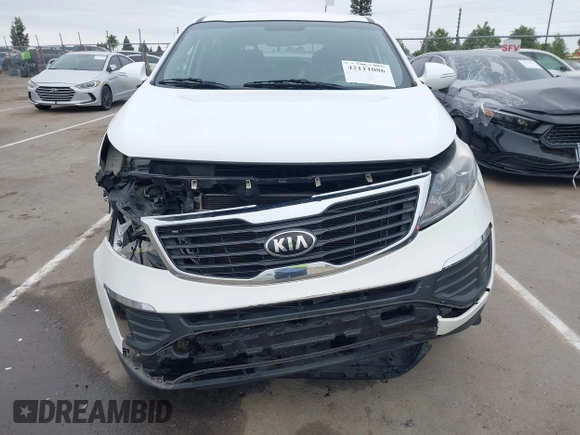 2013 Kia Sportage LX with VIN KNDPBCA21D7356092, listed as a IAAI auction lot 42111086 with 102,521 mi miles and . Bid and sale history available at carsss.com. Image 12.