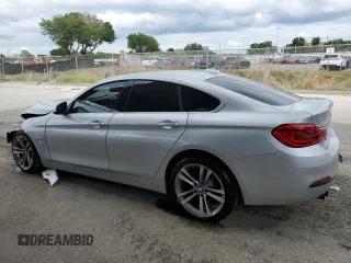 2019 BMW 4 Series 430i with VIN WBA4J1C57KBM13243, listed as a Copart auction lot 52214625 with 87,246 mi miles and Clean Title. Bid and sale history available at DreamBid. Image 2.