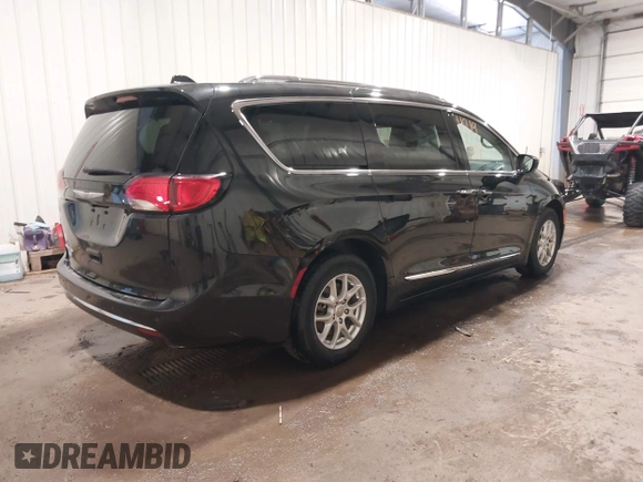 2020 Chrysler Pacifica Touring L with VIN 2C4RC1BG9LR140072, listed as a IAAI auction lot 42199118 with 93,557 mi miles and . Bid and sale history available at DreamBid. Image 4.