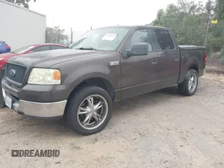 2005 Ford F-150 XLT with VIN 1FTRW12W15KE64553, listed as a IAAI auction lot 42009373 with 106,454 mi miles. Bid and sale history available at carsss.com. Image 2.