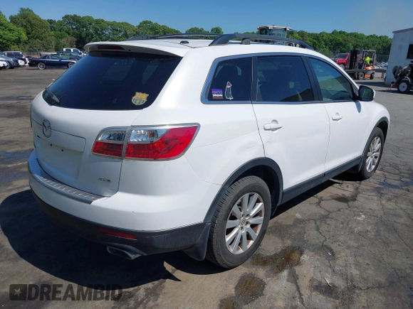 2010 Mazda CX-9 Sport with VIN JM3TB2MA9A0218565, listed as a IAAI auction lot 42133078 with 198,174 mi miles and . Bid and sale history available at DreamBid. Image 4.