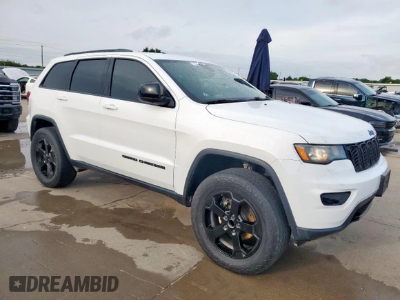 2018 Jeep Grand Cherokee Laredo with VIN 1C4RJFAG0JC391539, listed as a Copart auction lot 59133275 with 230,320 mi miles and Clean title. Bid and sale history available at DreamBid. Image 4.