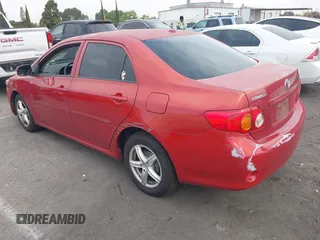 2009 Toyota Corolla with VIN JTDBL40E999058670, listed as a IAAI auction lot 42191508 with 129,398 mi miles and . Bid and sale history available at DreamBid. Image 3.