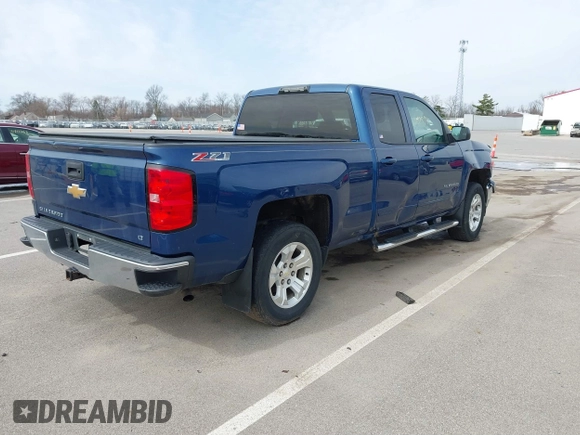 2015 Chevrolet Silverado 1500 LT with VIN 1GCVKREC3FZ424431, listed as a IAAI auction lot 41812094 with 227,739 mi miles. Bid and sale history available at carsss.com. Image 4.