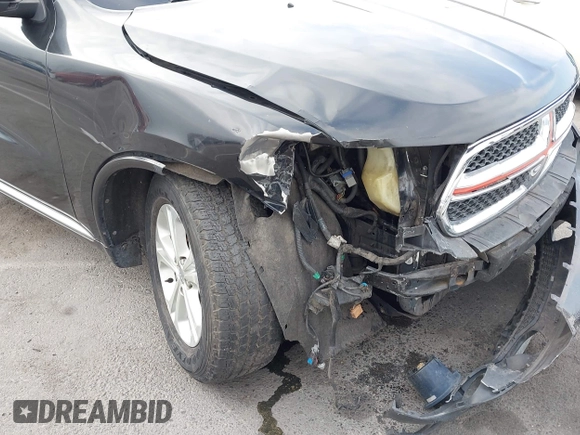 2012 Dodge Durango Crew with VIN 1C4SDHDT0CC321037, listed as a IAAI auction lot 42793232 with 162,593 mi miles and . Bid and sale history available at DreamBid. Image 6.
