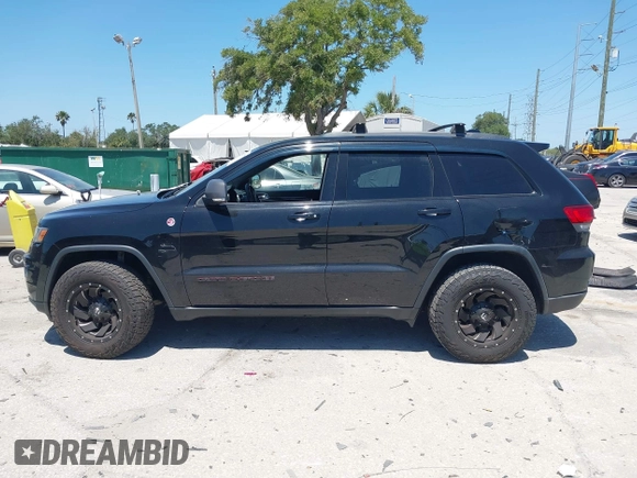 2017 Jeep Grand Cherokee Trailhawk with VIN 1C4RJFLG3HC836072, listed as a IAAI auction lot 42073775 with 139,374 mi miles and . Bid and sale history available at DreamBid. Image 14.