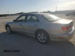2001 Mazda Millenia z VIN JM1TA221911716600, wystawiony jako Copart lot #57639185 z przebiegiem 86 947 mil mil oraz Tytuł czysty. Historia ofert i sprzedaży dostępna na DreamBid. Obrazek 2.