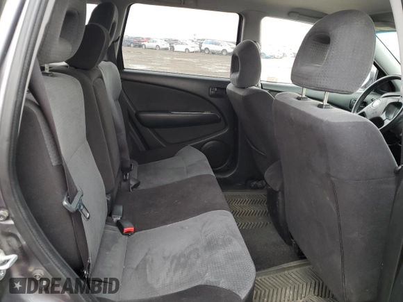 2005 Mitsubishi Outlander z VIN JA4LZ41F75U601526, wystawiony jako Copart lot #50974665 z przebiegiem 265 611 mil mil oraz Szkoda całkowita • Salvage title. Historia ofert i sprzedaży dostępna na DreamBid. Obrazek 11.