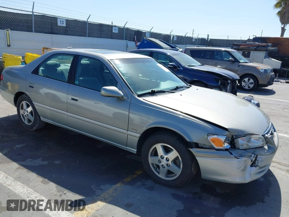 2001 Toyota Camry CE z VIN JT2BG22K210569246, wystawiony jako IAAI lot #41807555 z przebiegiem 79 226 mil mil oraz . Historia ofert i sprzedaży dostępna na DreamBid. Obrazek 1.