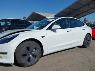 2023 Tesla Model 3 z VIN 5YJ3E1EA2PF410378, wystawiony jako IAAI lot #42265294 z przebiegiem 16 000 mil mil oraz . Historia ofert i sprzedaży dostępna na DreamBid. Obrazek 14.